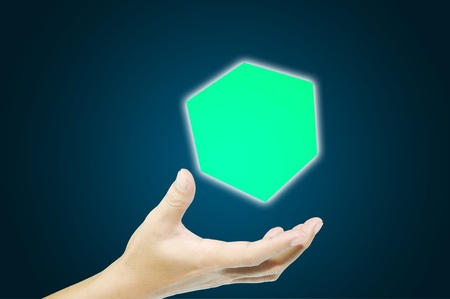 Business man hand holding cubic