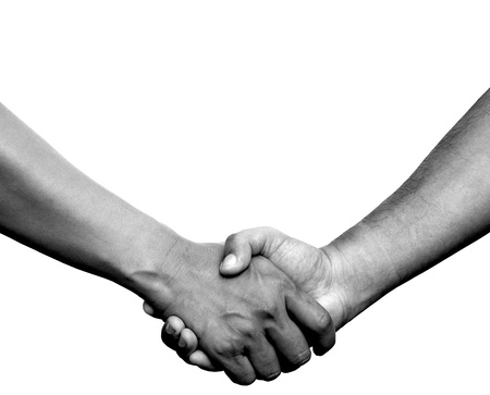 Handshake or hand in hand on white background の写真素材
