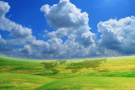 Beautiful Blue Sky With Green Grass Fieldの写真素材