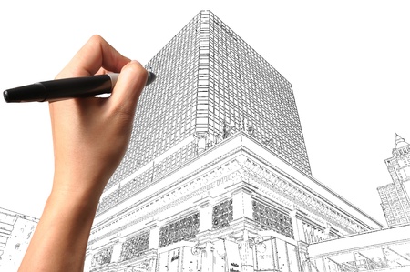 Male Hand drawing building and cityscape as architect planの写真素材