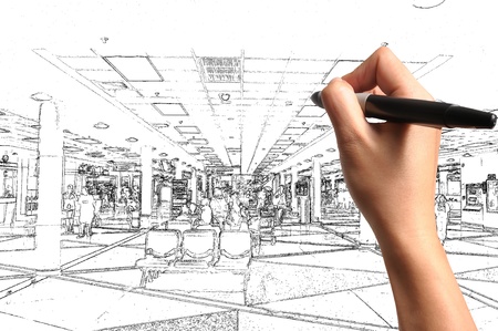 Male Hand drawing building and interior design as architect planの写真素材