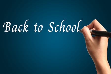 Male Hand write the word "Back to School"の写真素材