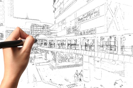 Hand of business man draw visual cityscapeの写真素材