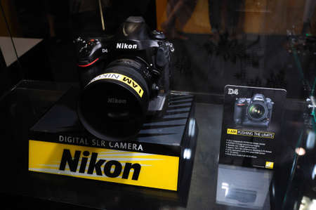 BANGKOK, THAILAND - FEB.19: The new Nikon D4 was presented at Nikon Booth in Thailand Photofair 2012 on FEB.19, 2012  at BITEC Exhibition center in Bangkok, Thailand.のeditorial素材