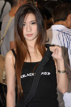 BANGKOK, THAILAND - FEB.19: Unidentified female presenting Photography product in Thailand Photofair 2012 on FEB.19, 2012  at BITEC Exhibition center in Bangkok, Thailand.のeditorial素材