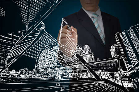 Business Man Drawing building and cityscapeの写真素材