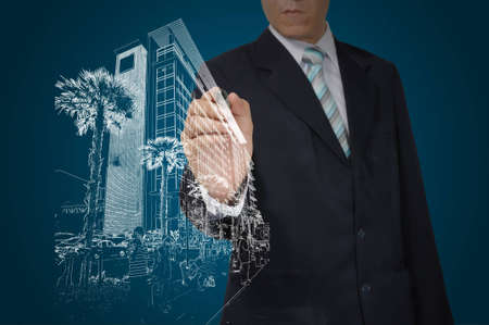 Business Man Drawing building and cityscapeの写真素材