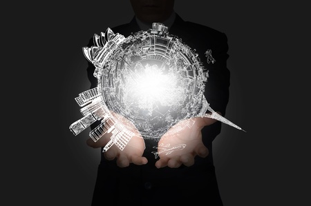 Business Man holding earth globeの写真素材