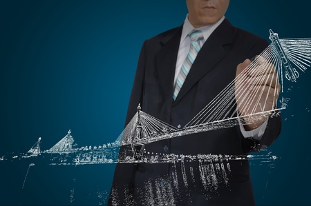 Business Man Drawing building and seascapeの写真素材