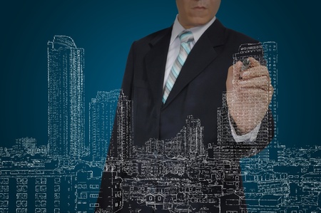 Business Man Drawing building and cityscapeの写真素材