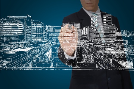 Business Man Drawing building and cityscapeの写真素材