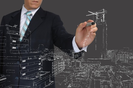 Business Man Drawing building and cityscapeの写真素材