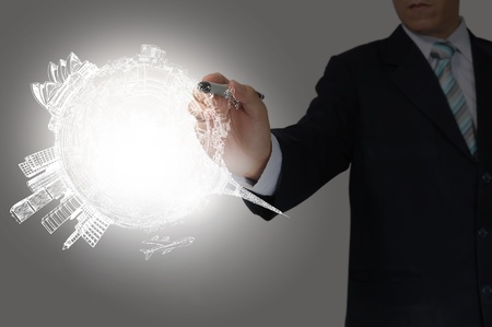 Business Man Drawing earth globeの写真素材