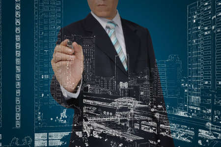 Business Man Drawing building and cityscapeの写真素材