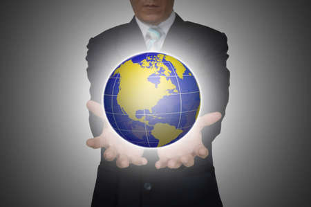 Hand of Business Man Hold Earth Globe   Elements of this image furnished by NASAの写真素材
