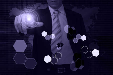 Business Man Pressing or Pushing on touch screen button or interfaceの写真素材
