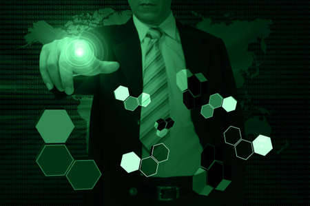 Business Man Pressing or Pushing on touch screen button or interfaceの写真素材