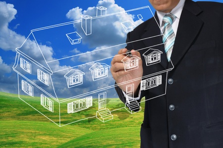 Business Man Draw House on Real Estate conceptの写真素材