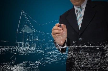 Business Man Draw House on Real Estate conceptの写真素材