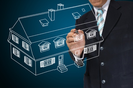 Business Man Draw House on Real Estate conceptの写真素材