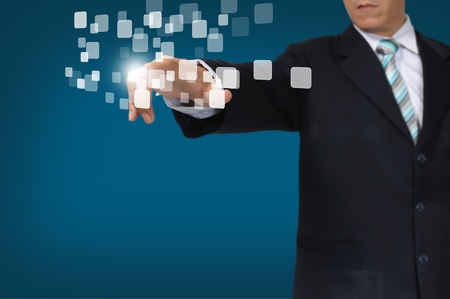 Business Man Pressing or Pushing on touch screen button or interfaceの写真素材