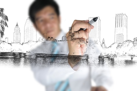 Business Man Drawing cityscapeの写真素材