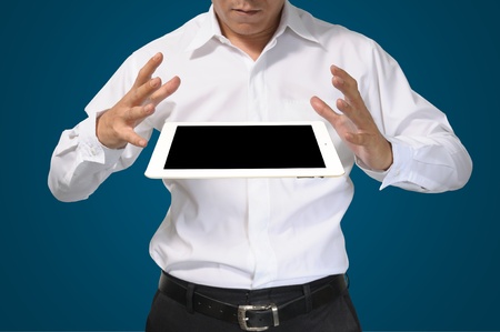 Hand of Business Man hold white tablet pcの写真素材