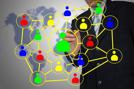 Hand of Business Man write Social network diagramの写真素材