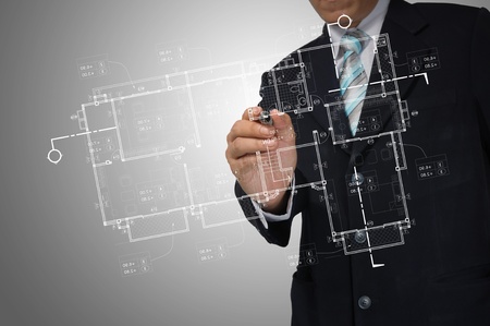 Hand of Business Man Draw architect or home planの写真素材