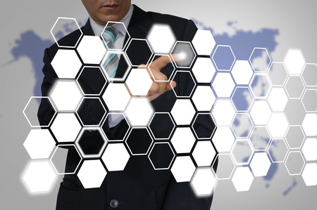 Hand of Business Man touch Hexagon interface の写真素材