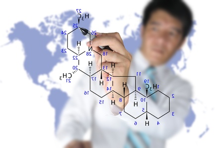 Male Teacher write science formula on white backgroundの写真素材
