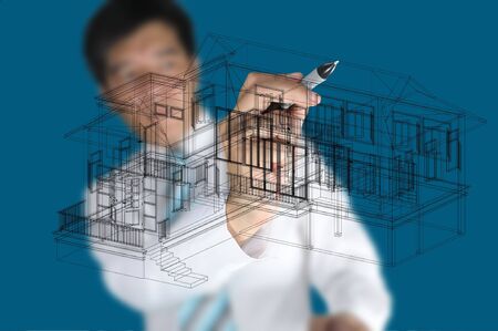 Hand of Business Man Draw 3D architect or home planの写真素材