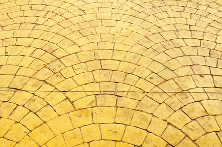 Old yellow pavement in a pattern の写真素材