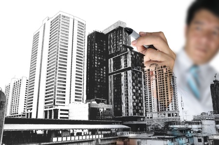 Business Man or Architect draw cityscapeの写真素材