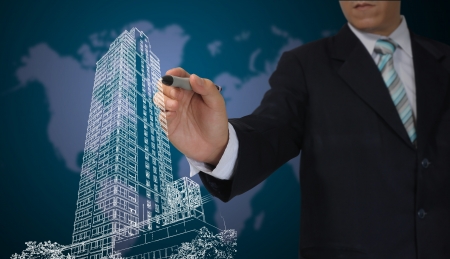 Business Man or Architect draw cityscapeの写真素材