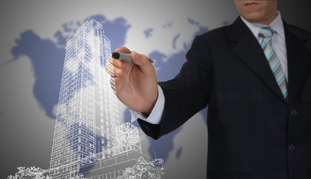 Business Man or Architect draw cityscapeの写真素材
