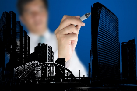 Business Man or Architect draw cityscape and buildingの写真素材