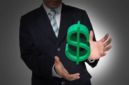 Hand of business Man holding Dollar symbolの写真素材