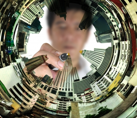 Business man draw cityscapeの写真素材