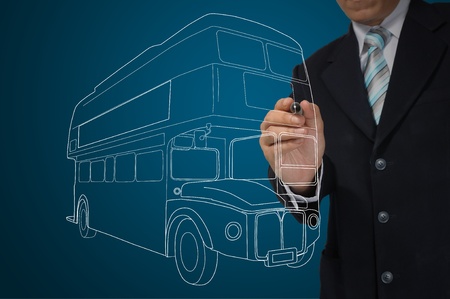 Business Man drawing London busの写真素材