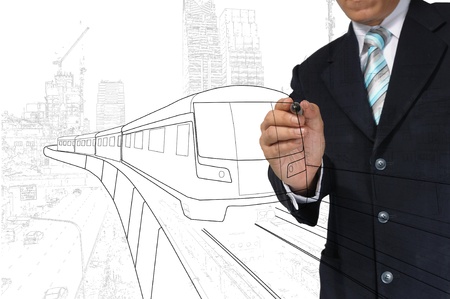 Business Man or architect drawing train or transportationの写真素材