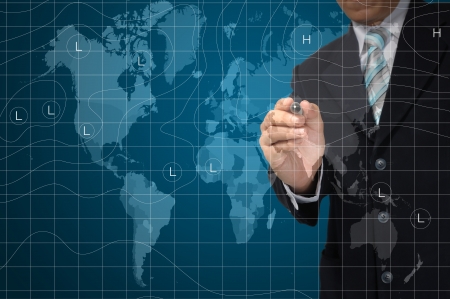 business Man drawing weather map. Elements of this image furnished by NASA  の写真素材