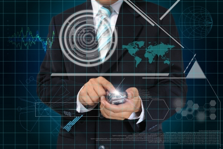 Hand of Business man touch smart phone with virtual digital interface or environmentの写真素材