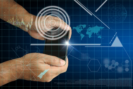 Hand of Business man touch smart phone with virtual digital interface or environmentの写真素材