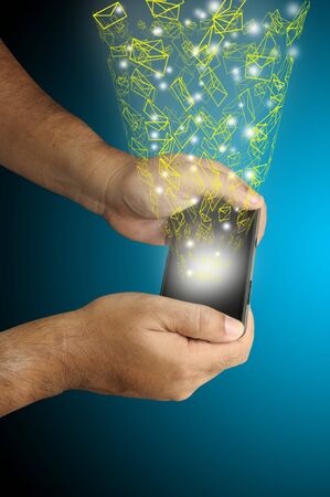 Hand of Business man touch smart phone with virtual digital network interface or environmentの写真素材