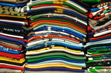 Stack of Colorful t-shirt for use as Backgroundの写真素材