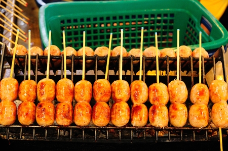 Thai Style Grilled Sausage on Street Market in Thailandの写真素材
