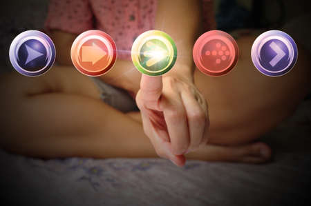 Hand of female or Business woman touch or push interface buttonの写真素材