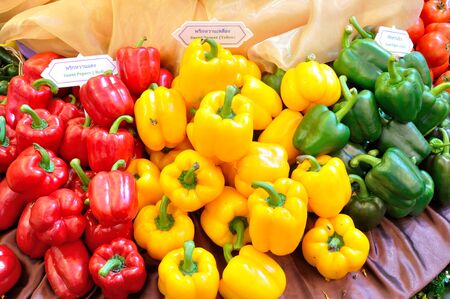 Yellow, Green and Red Sweet Peppers in The Market