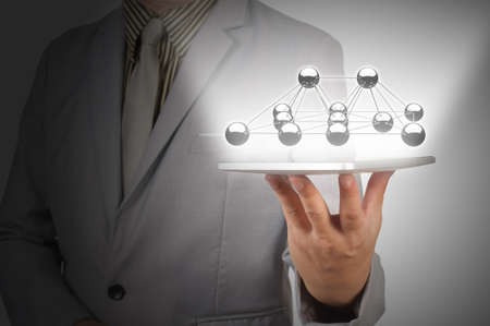 Business Man use Digital Computer Tablet present Network or Molecular